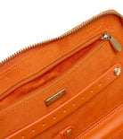 MARIA JEWELRY PORTFOLIO, Material: Leather 
Storage: 1 earring tab, 1 ring tab, 2 zip compartments, 4 snap-on necklace hooks with pocket 
LusterLoc™: Allows the fabric lining the inside of your jewellery cases to absorb the hostile gases known to cause tarnishing. Under typical storage conditions, it can prevent tarnishing for up to 35 years 
8.75" L X 5.25" W X 1.25" H 
, Gifts, WOLF DESIGNS, INC