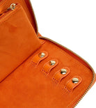 MARIA JEWELRY PORTFOLIO, Material: Leather 
Storage: 1 earring tab, 1 ring tab, 2 zip compartments, 4 snap-on necklace hooks with pocket 
LusterLoc™: Allows the fabric lining the inside of your jewellery cases to absorb the hostile gases known to cause tarnishing. Under typical storage conditions, it can prevent tarnishing for up to 35 years 
8.75" L X 5.25" W X 1.25" H 
, Gifts, WOLF DESIGNS, INC