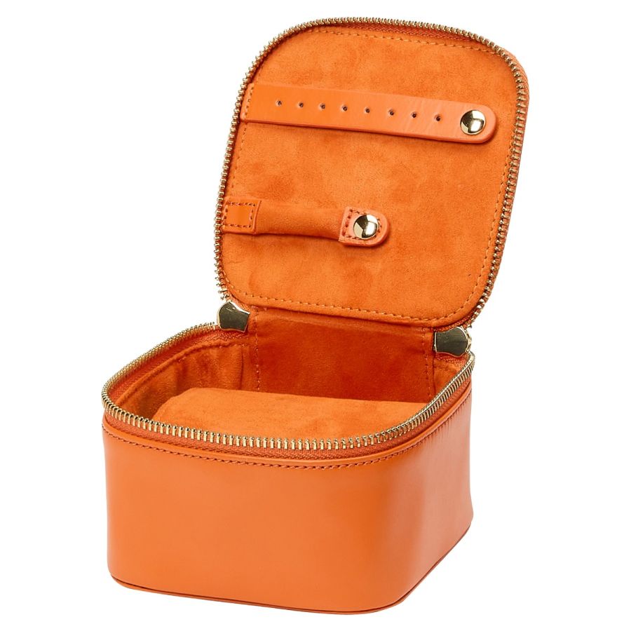 MARIA ZIP JEWELRY CUBE, Storage: 1 ring bar, 1 earring bar, 5 zip compartments 
LusterLoc™: Allows the fabric lining the inside of your jewellery cases to absorb the hostile gases known to cause tarnishing. Under typical storage conditions, it can prevent tarnishing for up to 35 years. 
4.5" L X 4.5" W X 3" H 
, Gifts, WOLF DESIGNS, INC