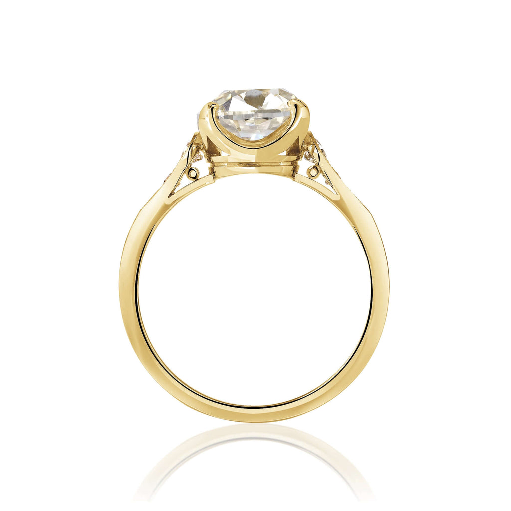 SINGLE STONE AMANDA RING featuring 3.35ct N/SI1 GIA certified antique cushion cut diamond with 0.16ctw old European cut accent diamonds prong set in a handcrafted 18K yellow gold mounting.