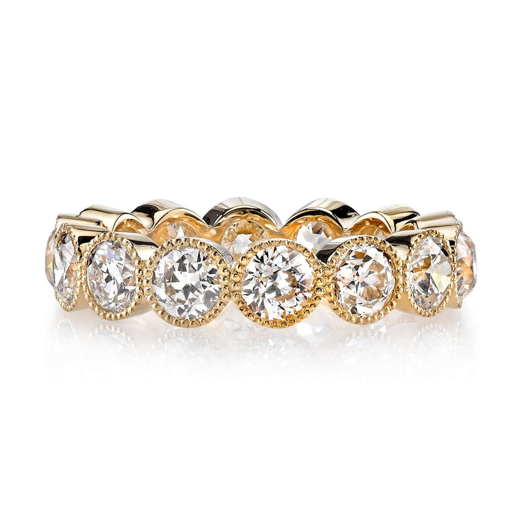 SINGLE STONE LARGE GABBY BAND | Approximately 1.50-1.70ctw old European cut diamonds set in a handcrafted bezel set half-eternity band. Approximate band width 4.8mm.