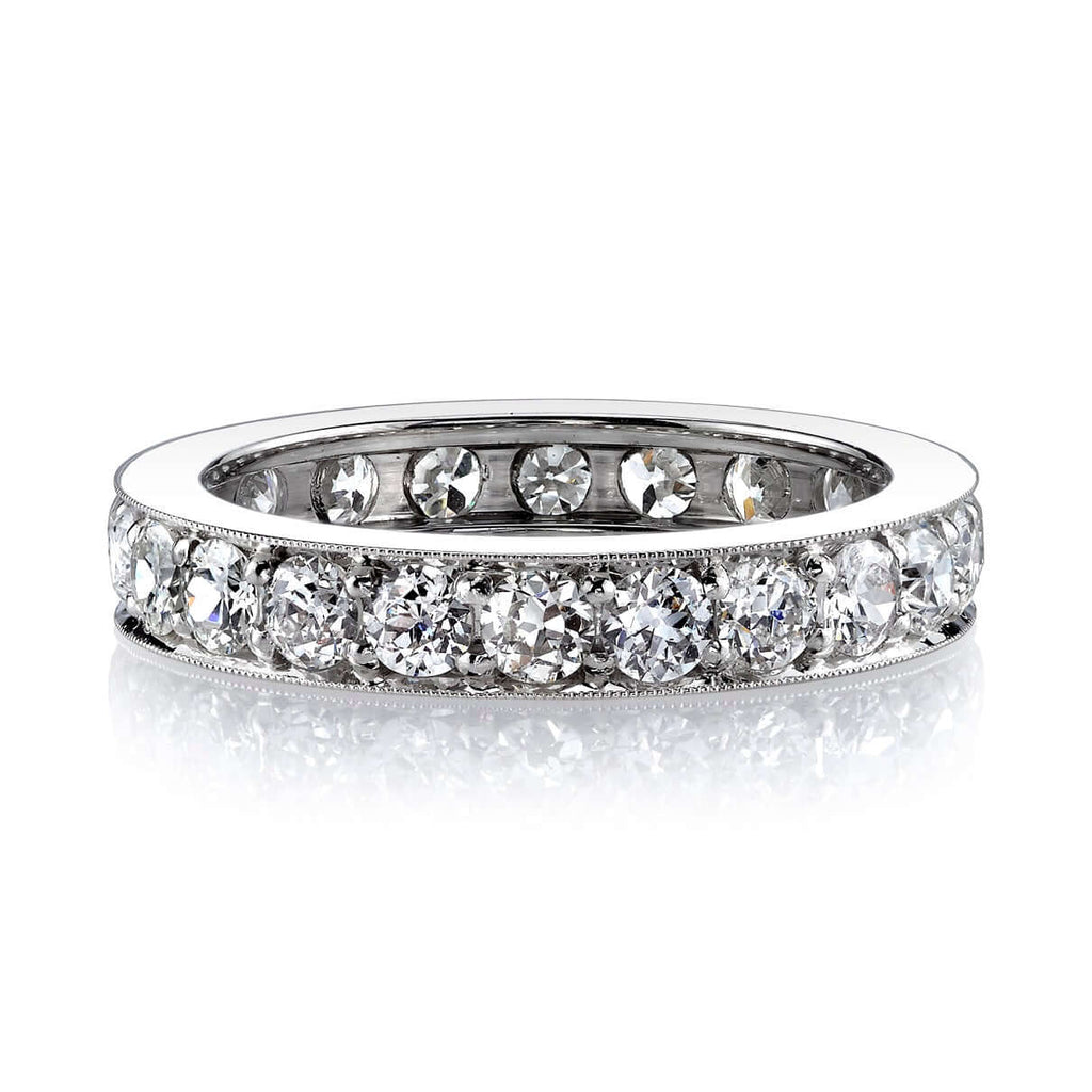 SINGLE STONE CARMELA MEDIUM BAND | Approximately 1.70ctw G-H/VS old European cut diamonds channel set in a handcrafted eternity band. Approximate band width 3.7mm. Please inquire for additional customization.