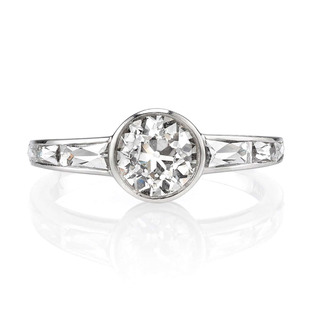 SINGLE STONE CHRISTINA RING featuring 1.04ct K/VS2 GIA certified old European cut diamond with 0.60ctw French cut accent diamonds set in a handcrafted platinum mounting.