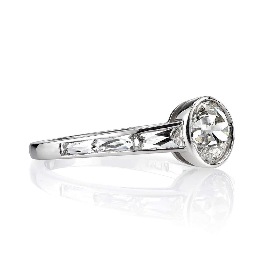 SINGLE STONE CHRISTINA RING featuring 1.04ct K/VS2 GIA certified old European cut diamond with 0.60ctw French cut accent diamonds set in a handcrafted platinum mounting.