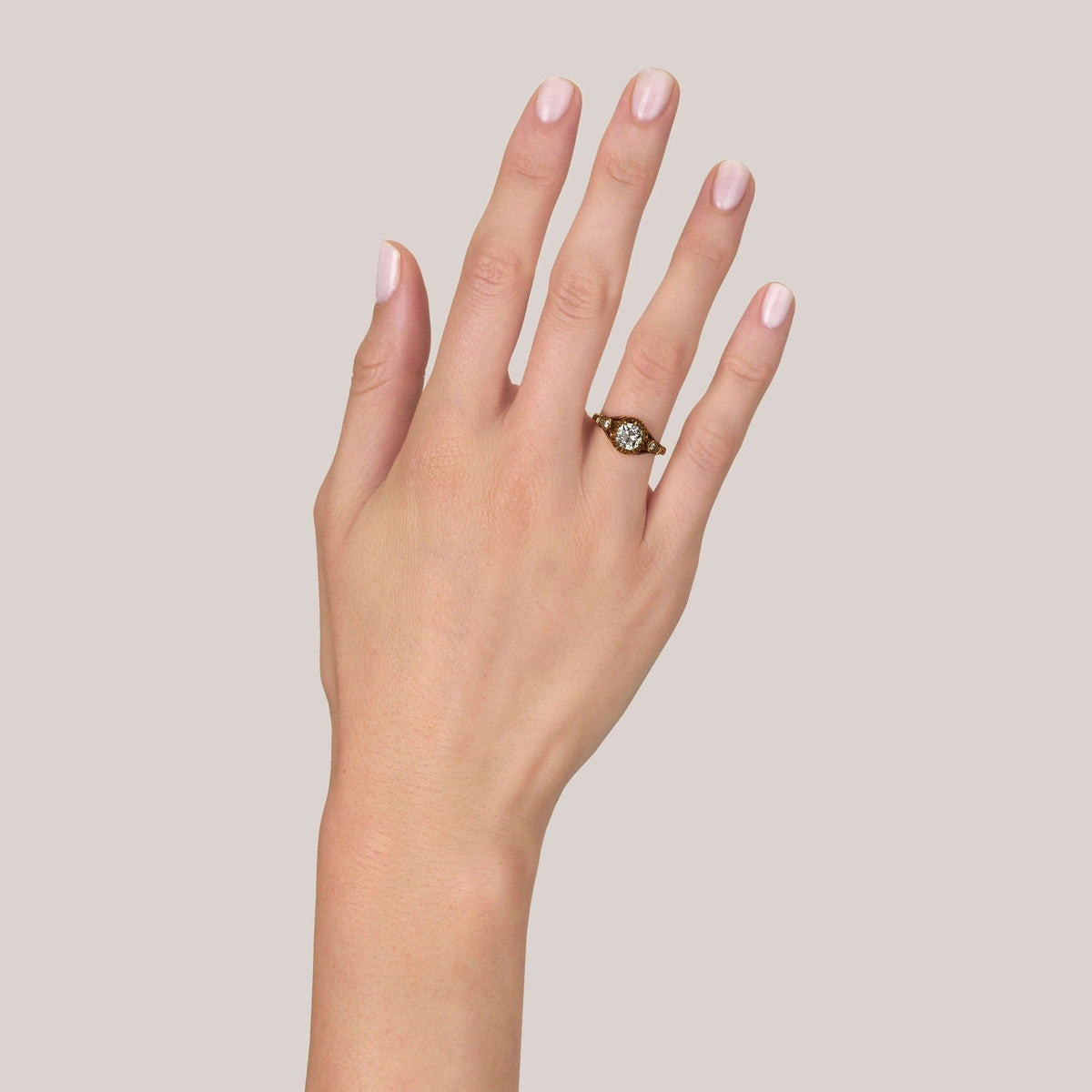 SINGLE STONE CLEO RING featuring 1.07ct L/SI1 EGL certified antique cushion cut diamond with 0.06ctw old European cut accent diamonds set in a handcrafted oxidized 18K yellow gold mounting.