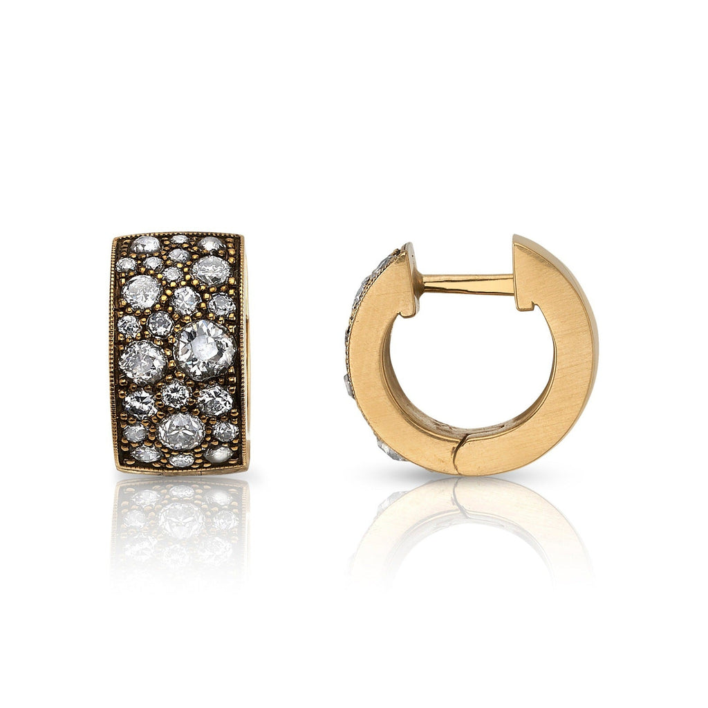 SINGLE STONE COBBLESTONE HUGGIES | Earrings featuring Approximately 1.40ctw - 1.60ctw varying old cut and round brilliant cut diamonds set in handcrafted 18k yellow gold huggie earrings. Price may vary according to diamond weight. *Cobblestone pattern may