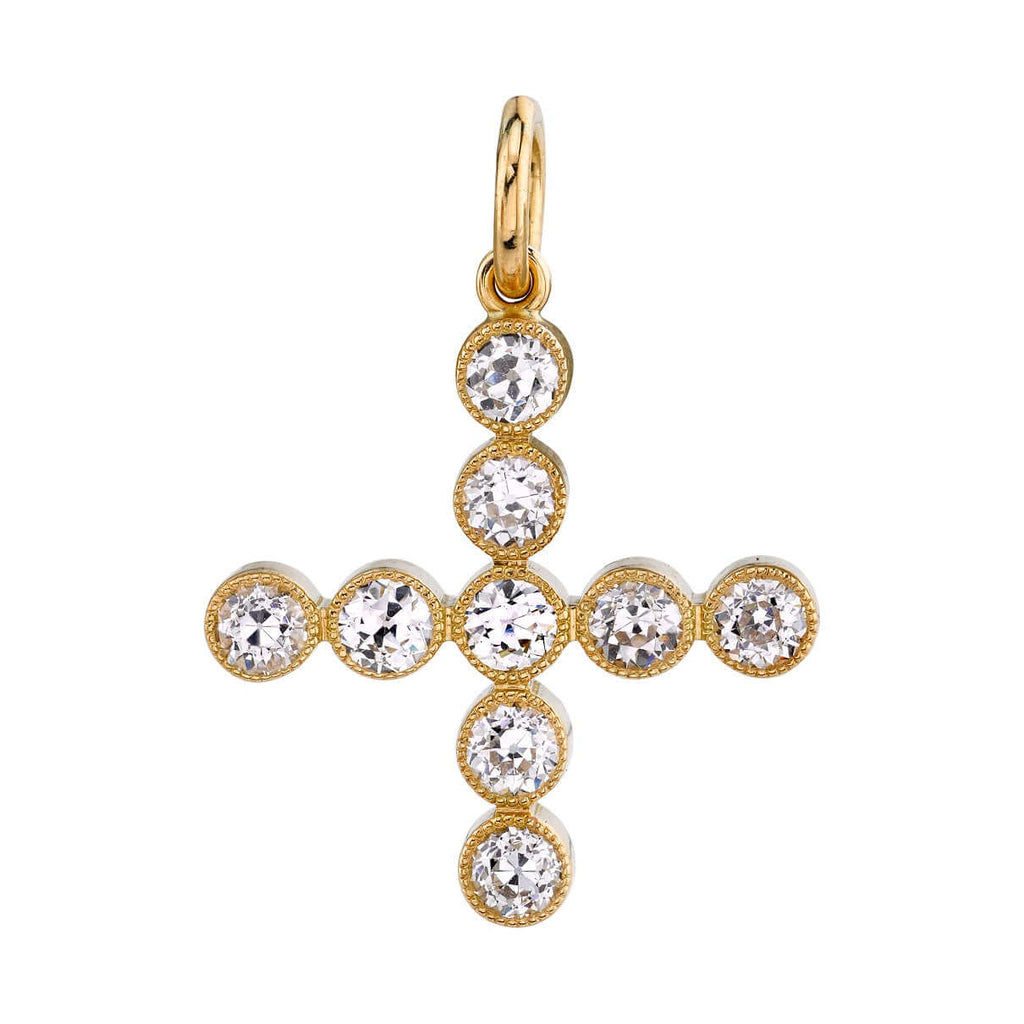 SINGLE STONE GABBY CROSS PENDANT featuring Approximately 1.10ctw G-H/VS-SI old European cut diamonds in a handcrafted 18K gold bezel set cross charm. Cross measures 20.6mm x 20.6mm. Price does not include chain.
