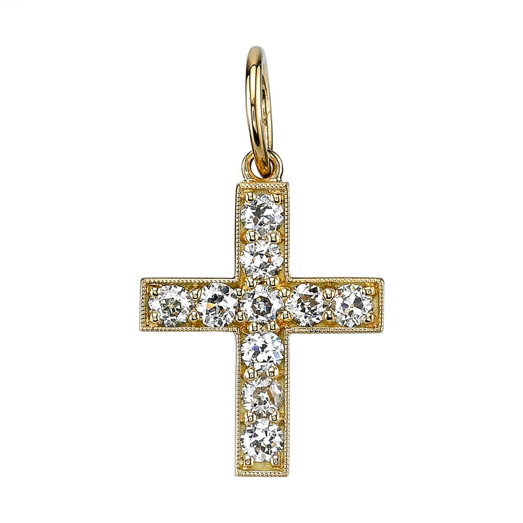 SINGLE STONE CARMELA CROSS PENDANT featuring Approximately 0.80ctw old European cut diamonds set in a handcrafted 18K yellow gold cross. Cross measures 14.20mm x 17mm. Price does not include chain. Please inquire for additional customization.