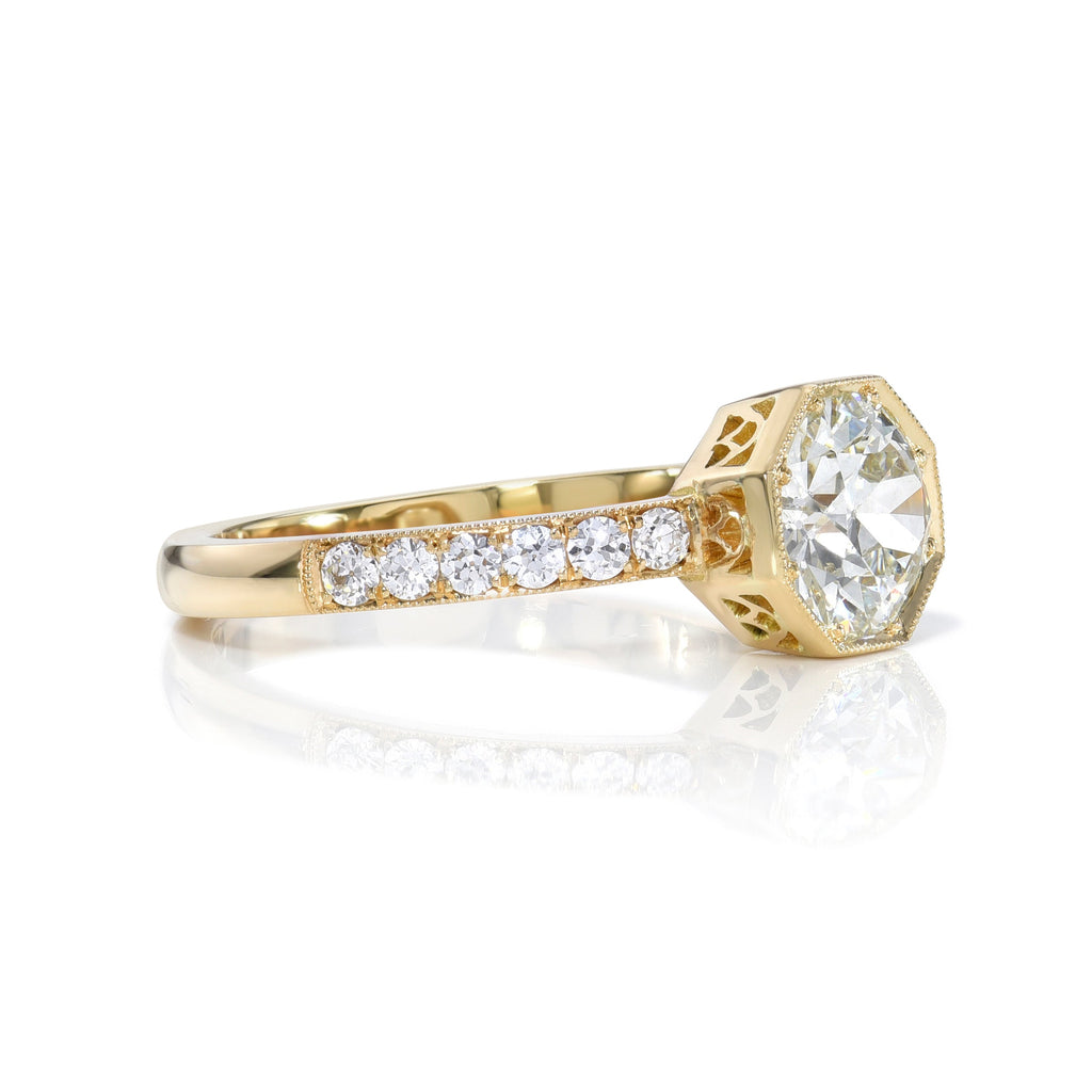 SINGLE STONE EMERSON WITH DIAMONDS RING featuring 0.90ct J/VS1 GIA certified old European cut diamond with 0.22ctw old European cut accent diamonds prong set in a handcrafted 18K yellow gold mounting.