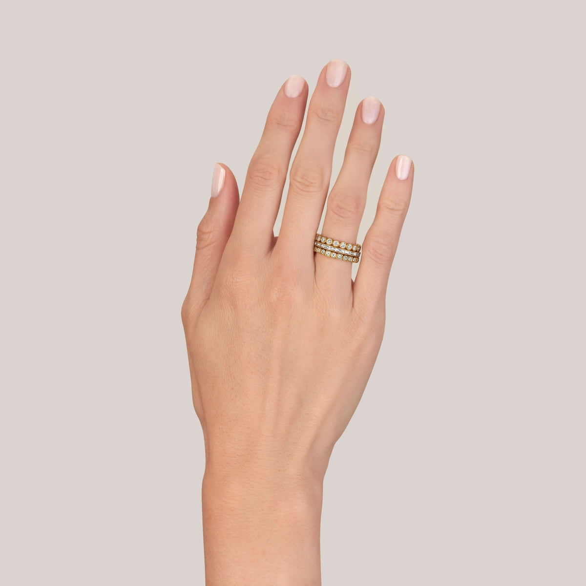 SINGLE STONE EMMA BAND | Approximately 0.90ctw G-H/VS French cut diamonds channel set in a handcrafted eternity band. Approximate band width 2mm. Please inquire for additional customization.