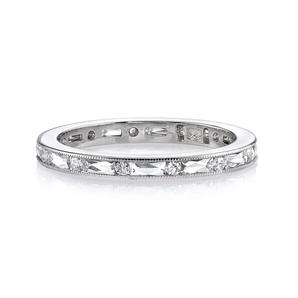SINGLE STONE PAIGE BAND | Approximately 0.75ctw G-H/VS alternating French and old European cut diamonds channel set in a handcrafted eternity band. Approximate band with 2.1mm. Please inquire for additional customization.