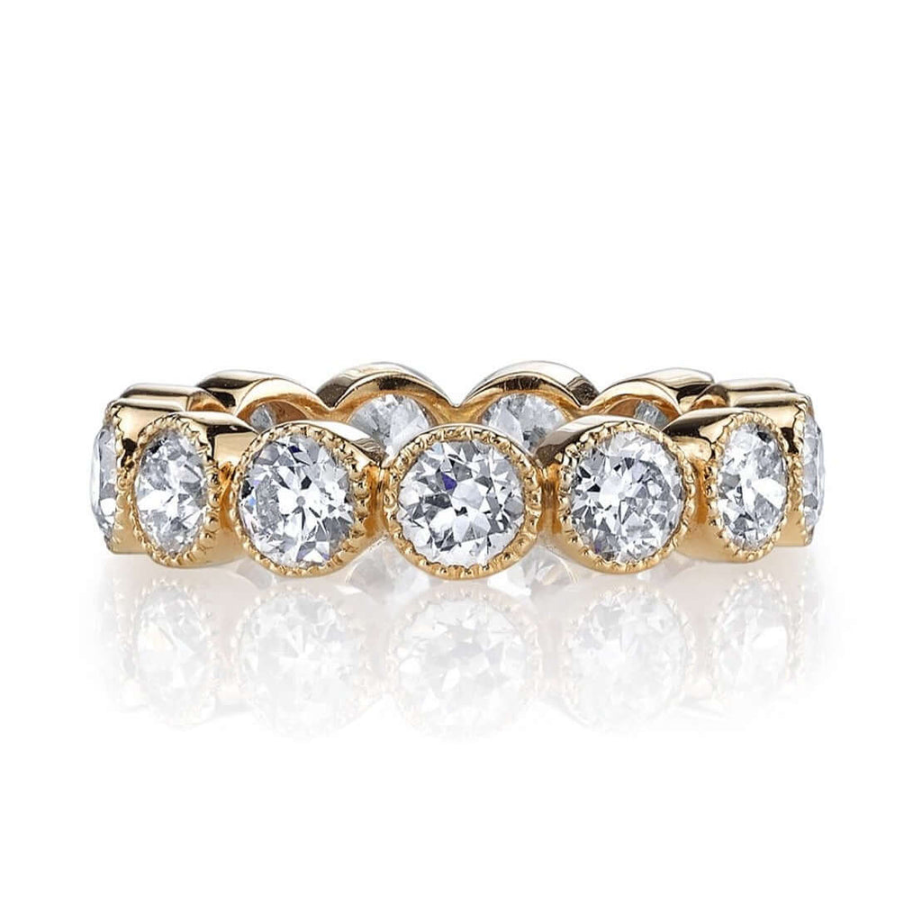 SINGLE STONE LARGE GABBY BAND | Approximately 1.50-1.70ctw old European cut diamonds set in a handcrafted bezel set half-eternity band. Approximate band width 4.8mm.