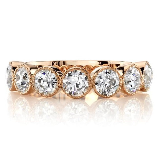 SINGLE STONE LARGE GABBY HALF BAND BAND | Approximately 1.50-1.70ctw old European cut diamonds set in a handcrafted bezel set half-eternity band. Approximate band width 4.8mm.