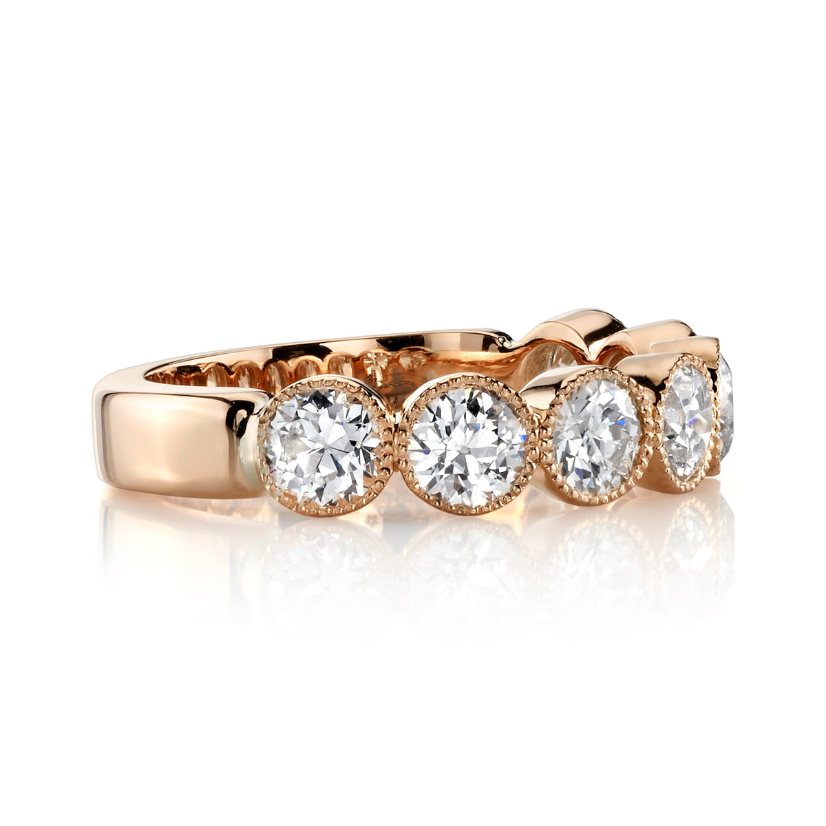 SINGLE STONE LARGE GABBY HALF BAND BAND | Approximately 1.50-1.70ctw old European cut diamonds set in a handcrafted bezel set half-eternity band. Approximate band width 4.8mm.