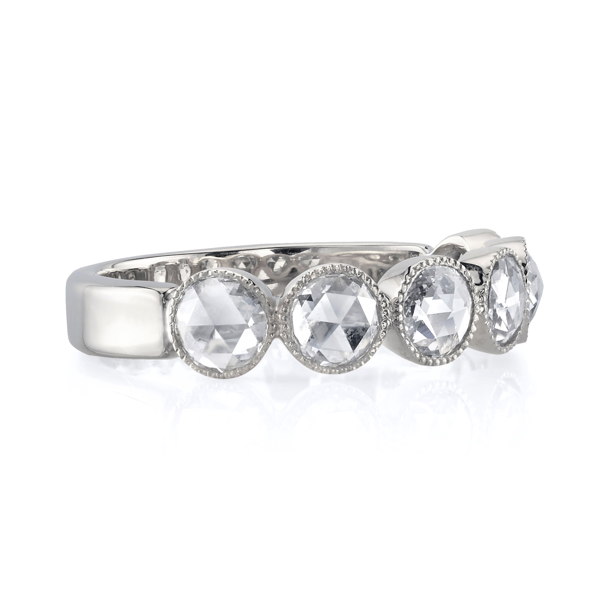 SINGLE STONE LARGE ROSE CUT GABBY HALF BAND BAND | ﻿Approximately 0.90ctw rose cut diamonds set in a handcrafted bezel set half-eternity band. Approximate band width 4.8mm. Please inquire for additional customization.