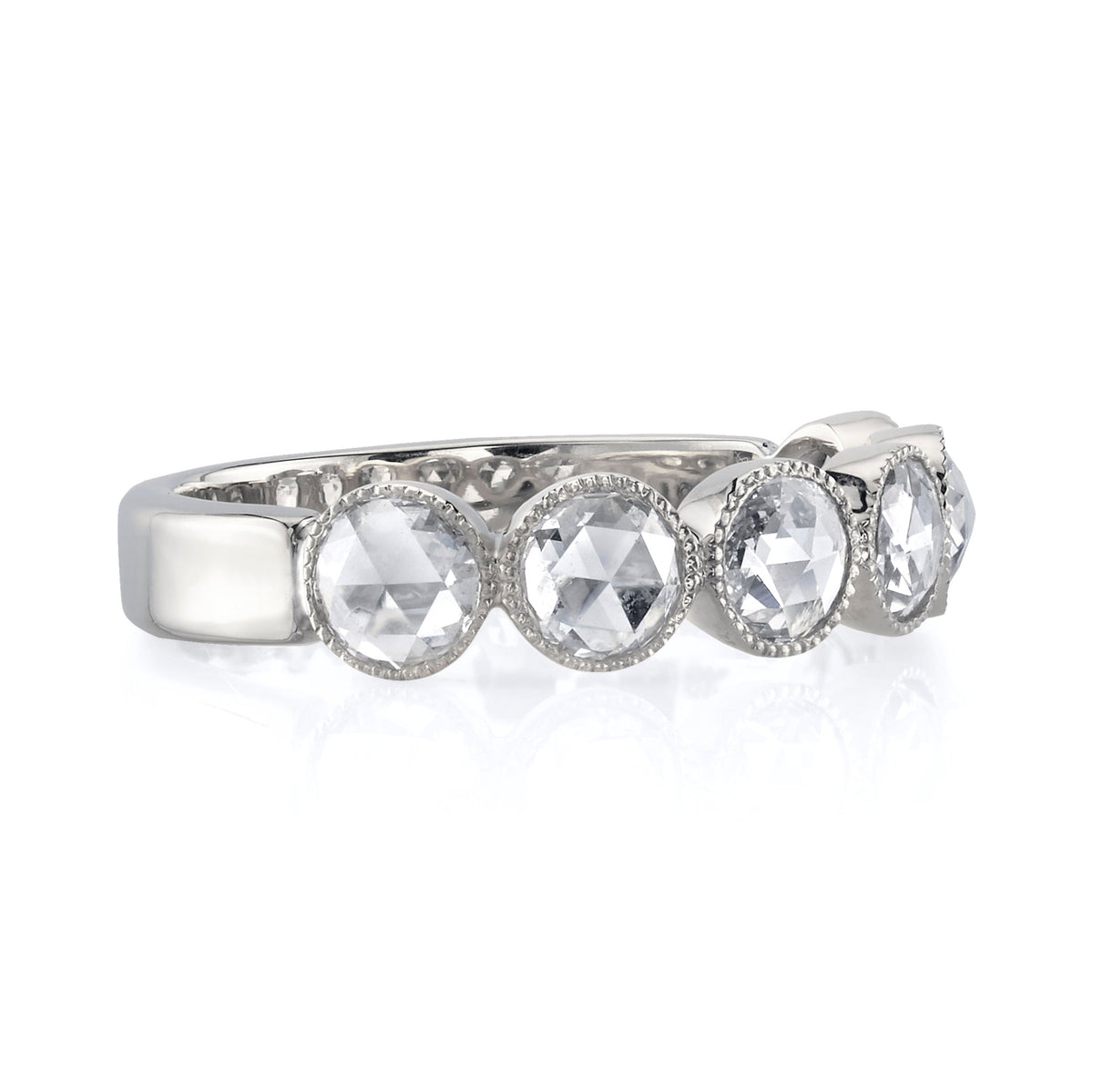 SINGLE STONE LARGE ROSE CUT GABBY HALF BAND BAND | ﻿Approximately 0.90ctw rose cut diamonds set in a handcrafted bezel set half-eternity band. Approximate band width 4.8mm. Please inquire for additional customization.