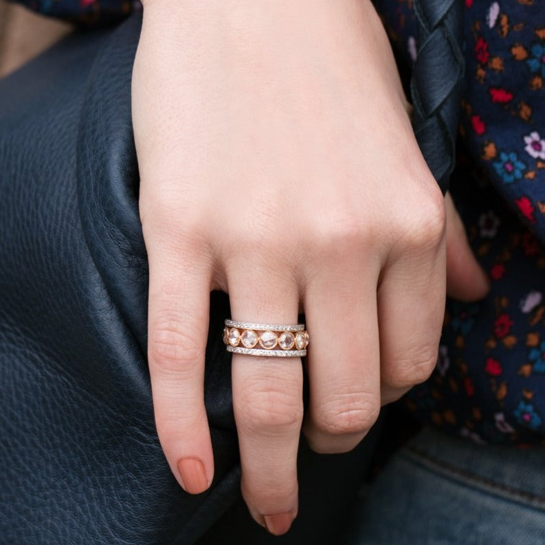 SINGLE STONE LARGE ROSE CUT GABBY HALF BAND BAND | ﻿Approximately 0.90ctw rose cut diamonds set in a handcrafted bezel set half-eternity band. Approximate band width 4.8mm. Please inquire for additional customization.