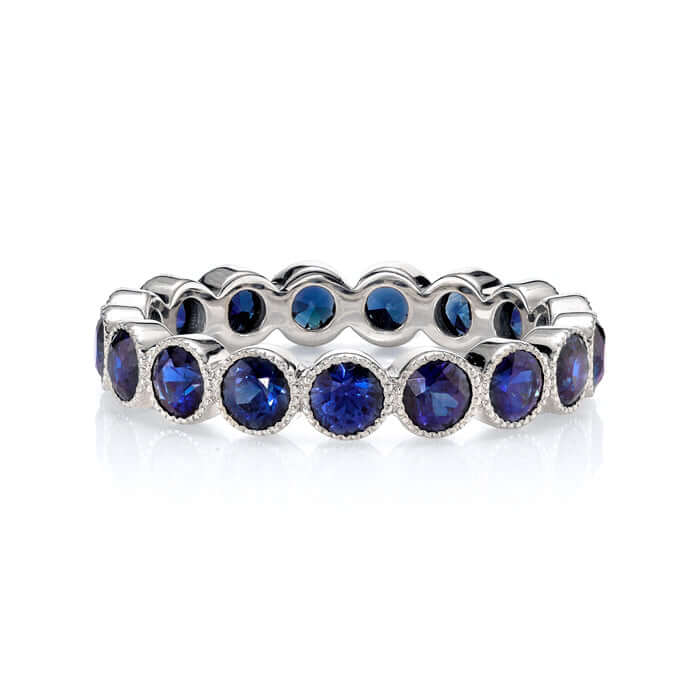 SINGLE STONE MEDIUM GABBY WITH GEMSTONES BAND | Approximately 2.30ctw round cut gemstones bezel set in a handcrafted eternity band. Approximate band with 3.6mm. Please inquire for additional customization.