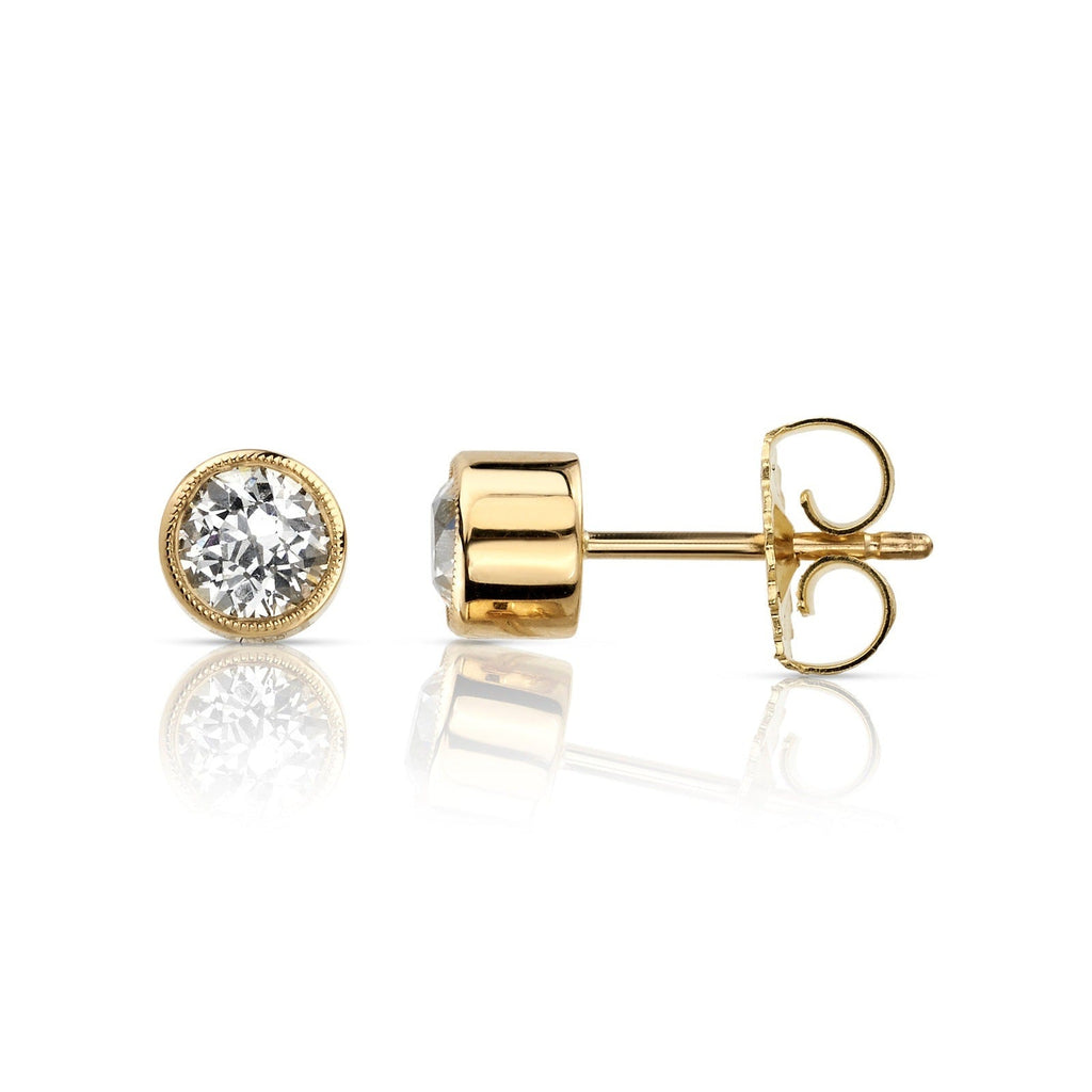 SINGLE STONE GABBY STUDS | Earrings featuring 0.72ctw I/VS2-SI1 Old Mine cut diamonds bezel set in handcrafted 18K yellow gold stud earrings.