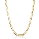 SINGLE STONE GIANA NECKLACE featuring Handcrafted 18K yellow gold full bar necklace. Necklace measures 17".