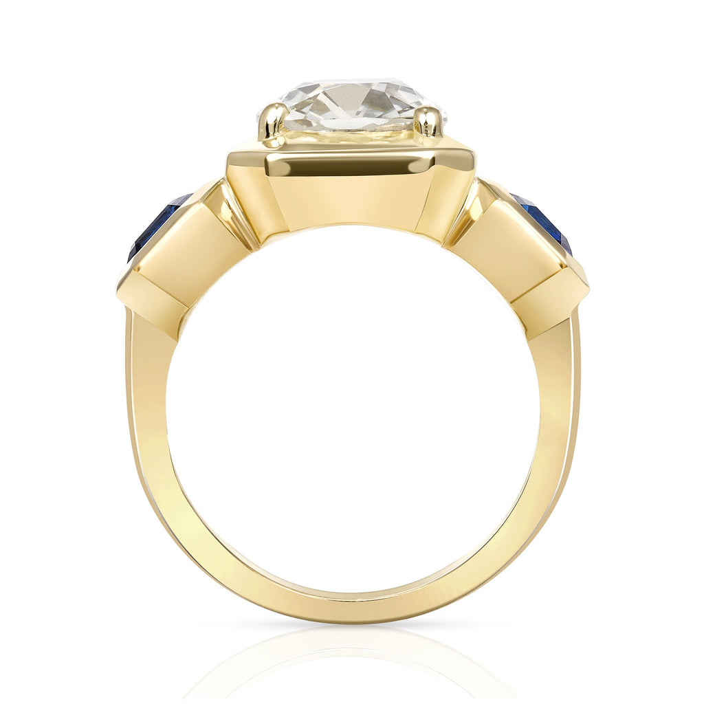 SINGLE STONE GLORIA RING featuring 2.86ct O-P/I2 GIA certified antique cushion cut diamond with 1.50ctw Asscher cut blue sapphires set in a handcrafted 18K yellow gold mounting.