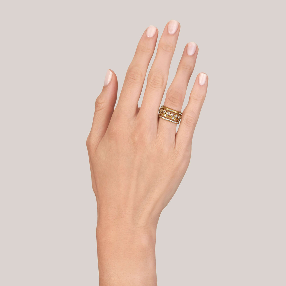 SINGLE STONE GROVER BAND | Approximately 0.15ctw G-H/VS old European cut diamonds set in a handcrafted satin finish eternity band. Approximate band width 2mm. Please inquire for additional customization.