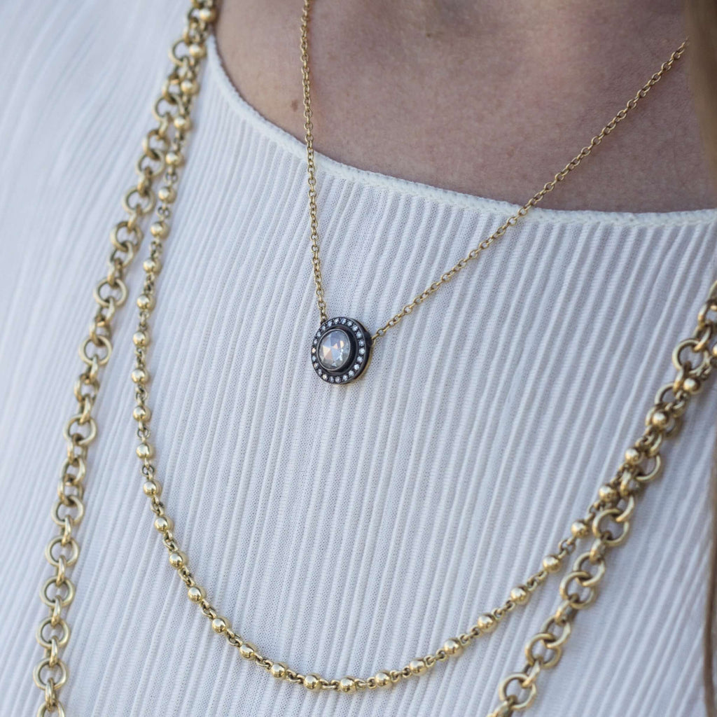 SINGLE STONE KENDALL NECKLACE featuring 0.78ct F/SI2 rose cut diamond with 0.13ctw single cut accent diamonds set in a handcrafted 18K oxidized yellow gold and silver pendant.