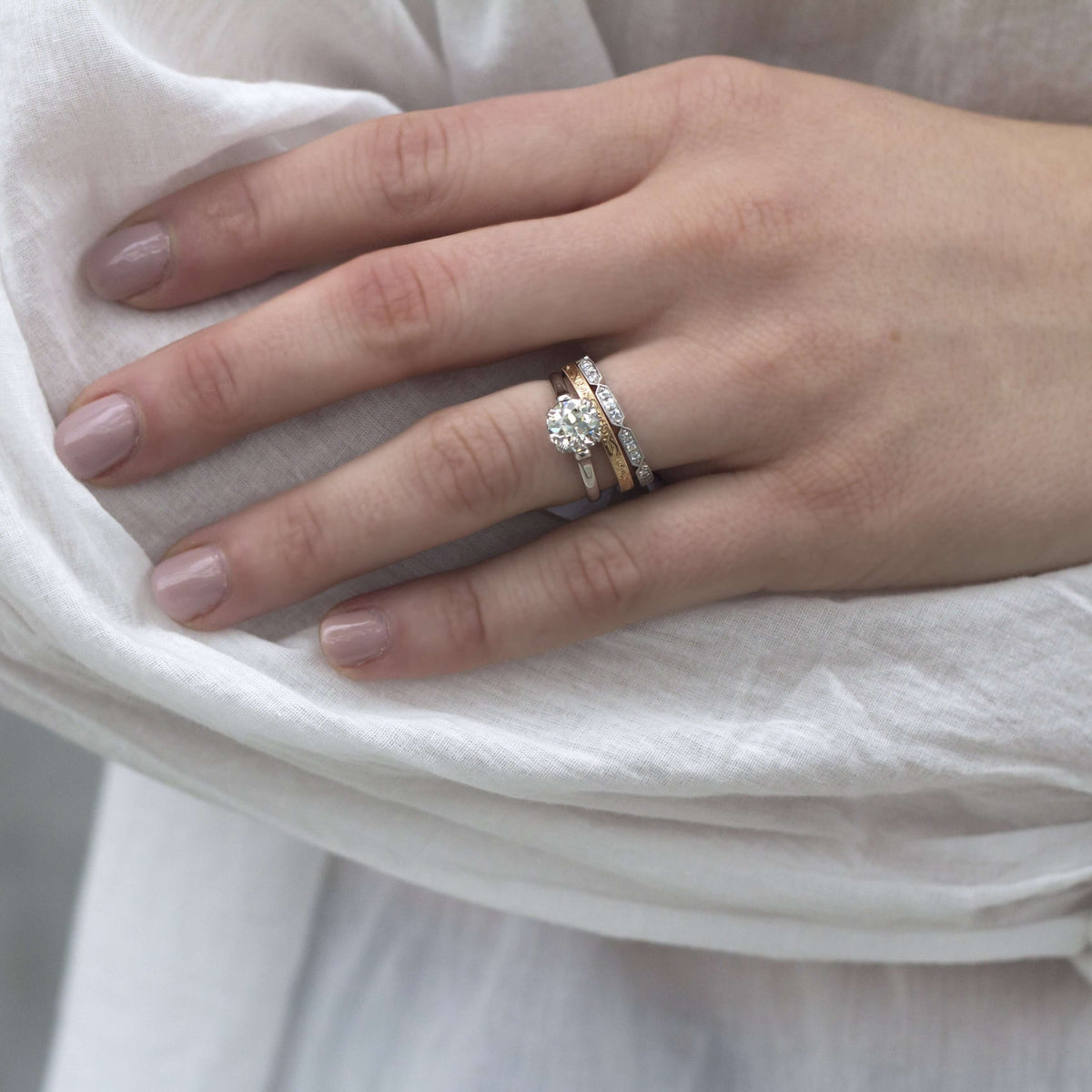 SINGLE STONE OLIVIA BAND | Approximately 0.50ctw G-H/VS French cut diamonds set in a handcrafted sectional eternity band. Approximate band with 2.1mm. Please inquire for additional customization.