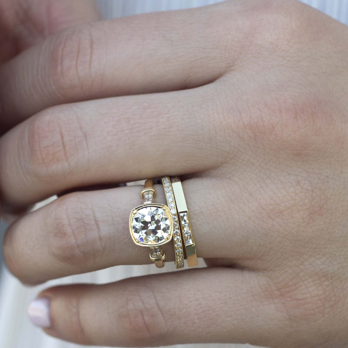 SINGLE STONE JACQUELINE BAND | Approximately 0.40ctw G-H/VS French cut diamonds set in a handcrafted sectional band. Approximate band width 2mm. Please inquire for additional customization.