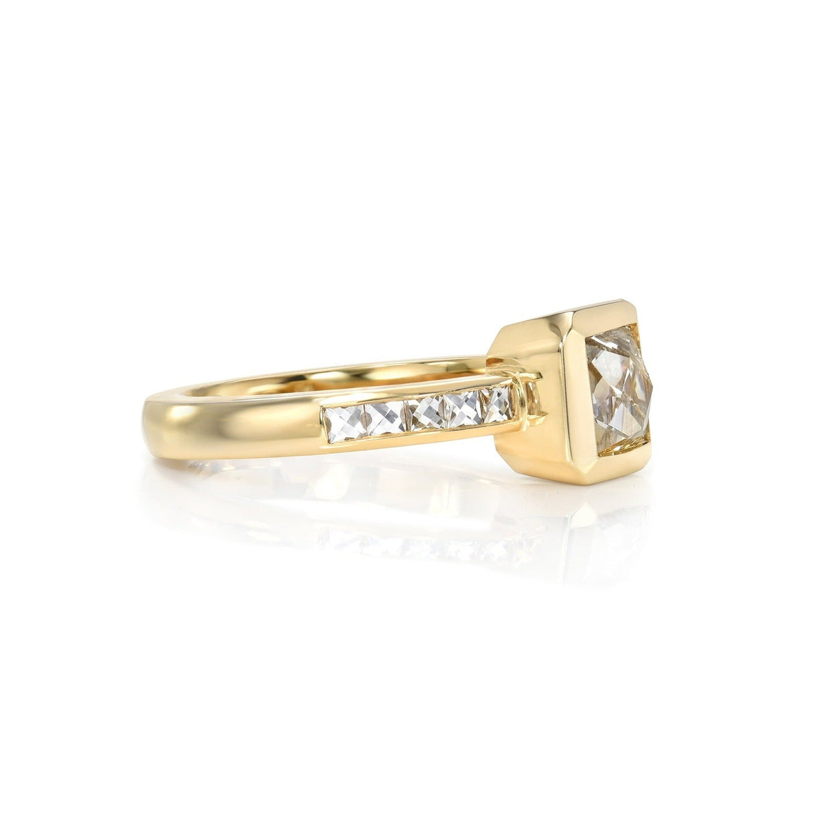 SINGLE STONE KARINA RING featuring 1.24ct G/I1 GIA certified French cut diamond with 0.40ctw French cut accent diamonds set in a handcrafted 18K yellow gold mounting.