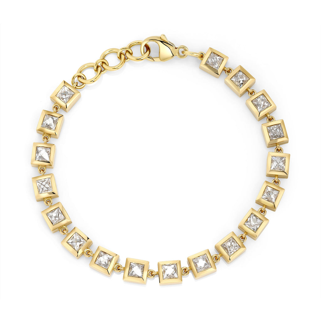 SINGLE STONE LARGE KARINA BRACELET featuring 8.65ctw H-I/SI-VS French cut diamonds bezel set in a handcrafted 18K yellow gold bracelet. Bracelet measures 7.5"