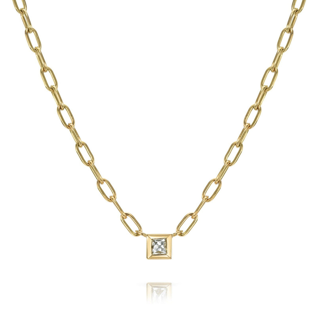 SINGLE STONE KARINA NECKLACE featuring 0.35ct J-K/VS French cut diamond bezel set on a handcrafted 18K yellow gold pendant necklace. Necklace measures 17"
