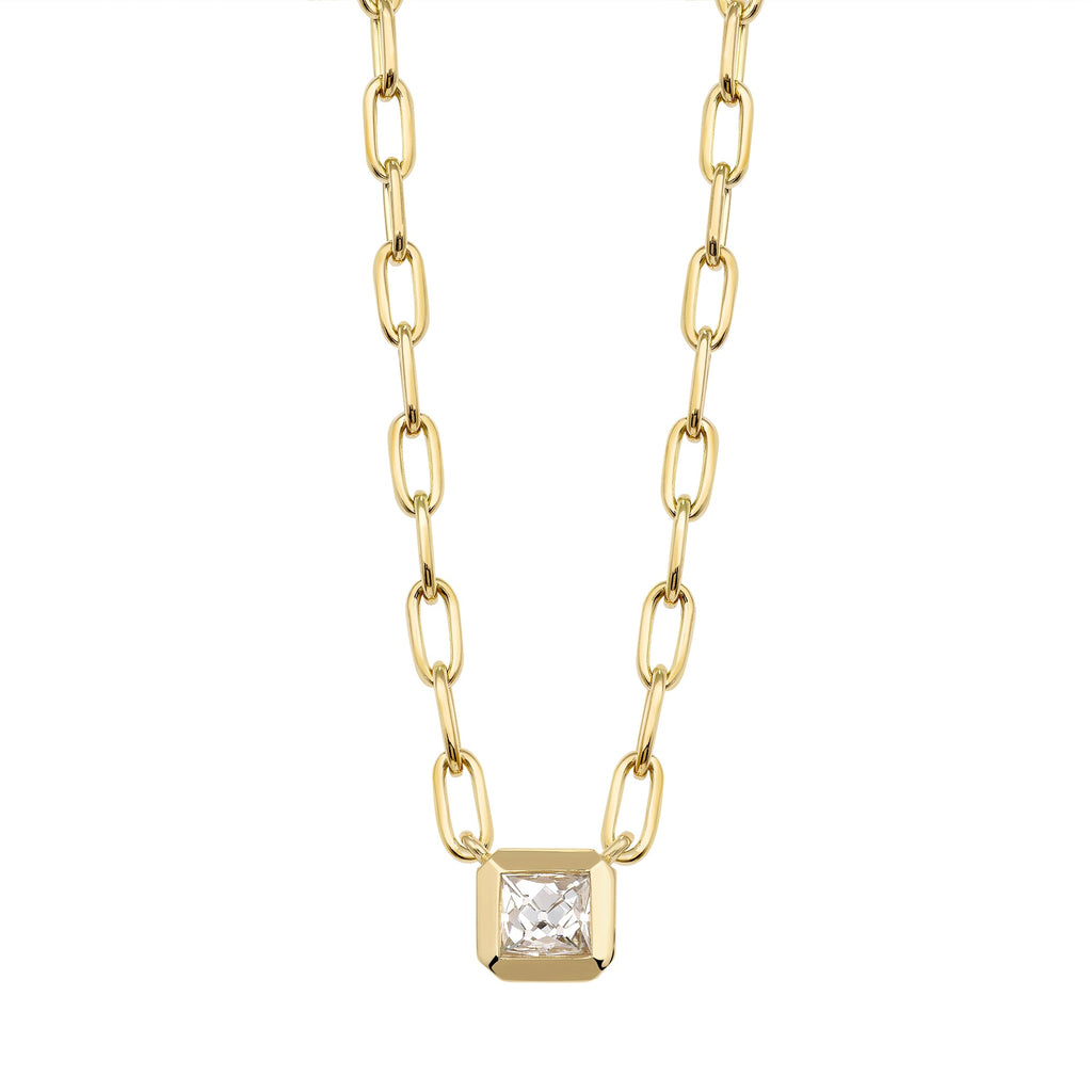 SINGLE STONE KARINA NECKLACE featuring 0.71ct J/VS2 GIA certified French cut diamond bezel set on a handcrafted 18K yellow gold pendant necklace. Necklace measures 17"