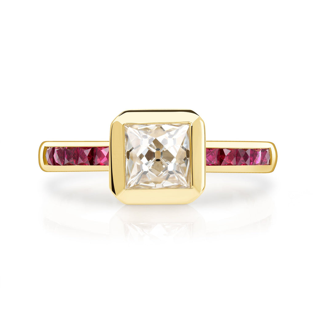 SINGLE STONE KARINA RING featuring 1.16ct G/VS2 GIA certified French cut diamond with 0.42ctw French cut ruby accent stones bezel set in a handcrafted 18K yellow gold mounting.
