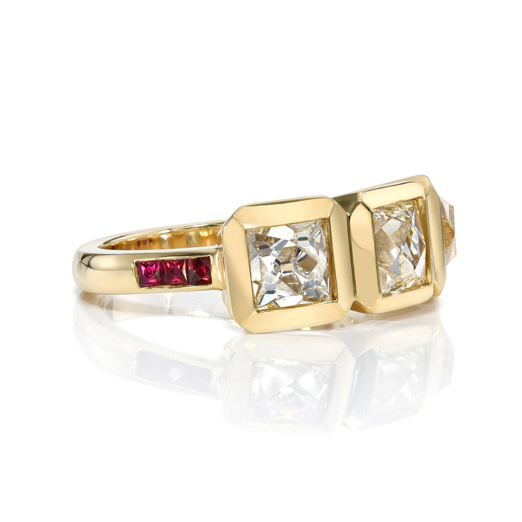 SINGLE STONE THREE STONE KARINA RING featuring 2.93ctw F-H/VS1-VS2-I1 GIA certified French cut diamonds with 0.24ctw square French cut rubies bezel set in a handcrafted 18K yellow gold mounting.