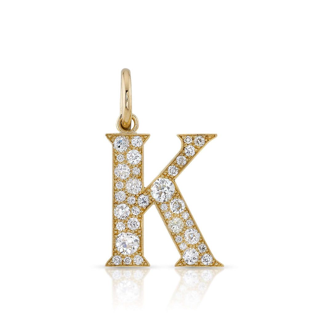 SINGLE STONE LARGE COBBLESTONE LETTERS PENDANT featuring Approximately 0.95ctw-2.75ctw varying old cut and round brilliant cut diamonds set in a handcrafted 18K yellow gold letter pendant. Letters are approximately 1" tall. Available in an oxidized or pol