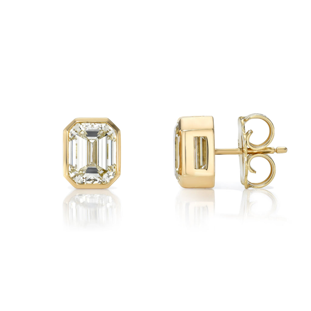 SINGLE STONE LEAH STUDS | Earrings featuring 4.02ctw O-P/VVS1 GIA certified emerald cut diamonds bezel set in handcrafted 18K yellow gold stud earrings.