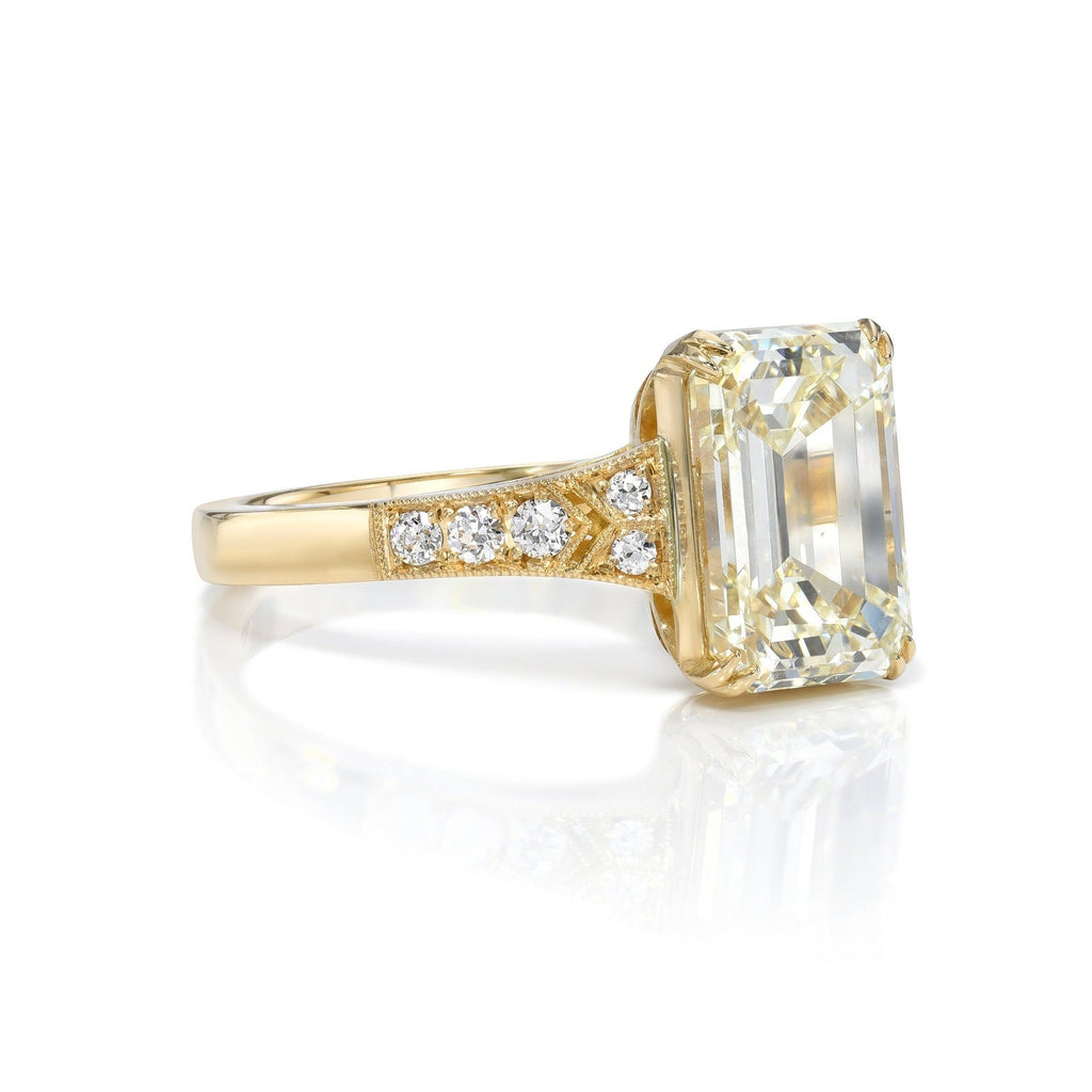 SINGLE STONE LORRAINE RING featuring 3.01ct O-P/VS2 GIA certified emerald cut diamond with 0.07ctw old European cut accent diamonds set in a handcrafted 18K yellow gold mounting.