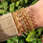 SINGLE STONE SMALL DOROTHY BRACELET featuring Handcrafted 18K yellow gold long bead bracelet. Bracelet measures 7.5".
