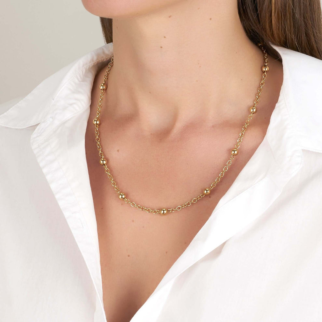 SINGLE STONE NATASHA NECKLACE featuring Handcrafted 18K yellow gold link and bead necklace. Available in multiple lengths. Length shown is 16.5".