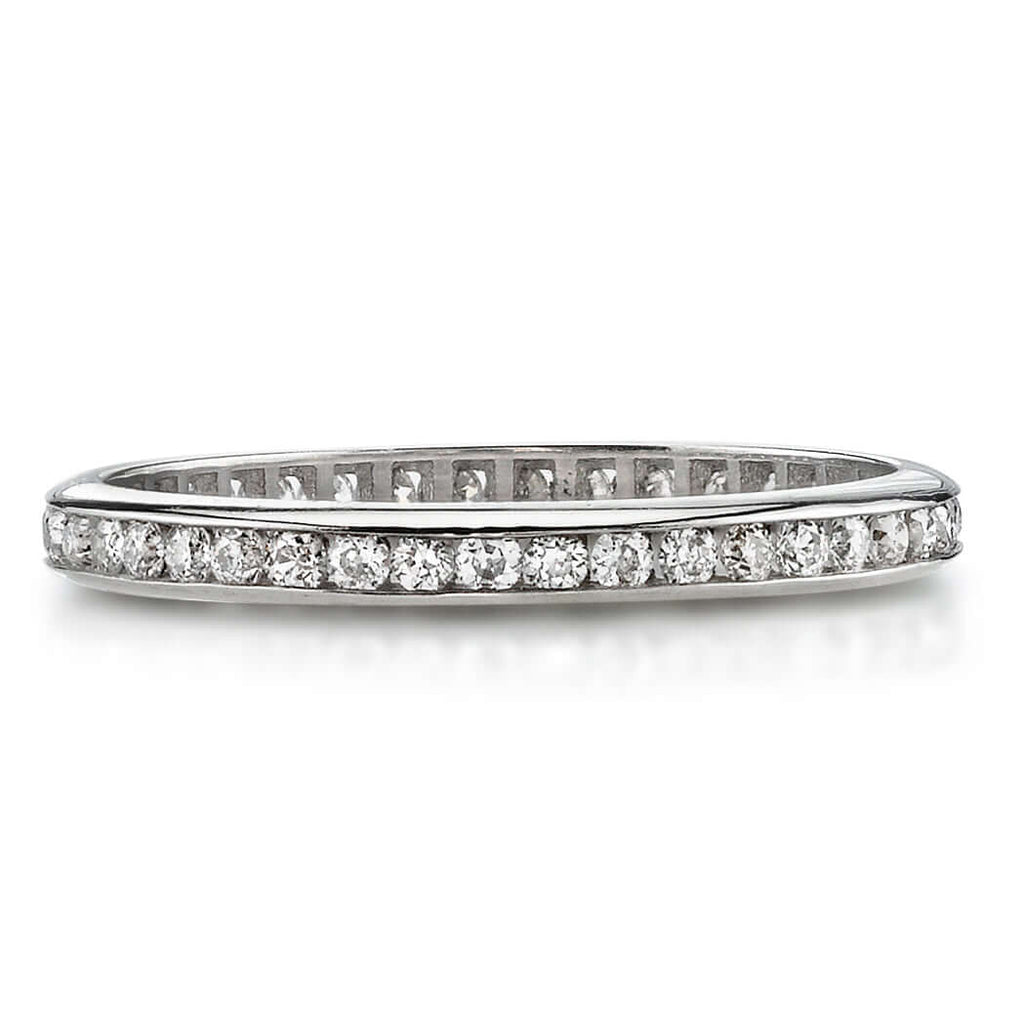 SINGLE STONE MADISON BAND | Approximately 0.40ctw old European cut diamonds channel set in a handcrafted eternity band. Available with polished or engraved sidewalls. Approximate band width 2.1mm.