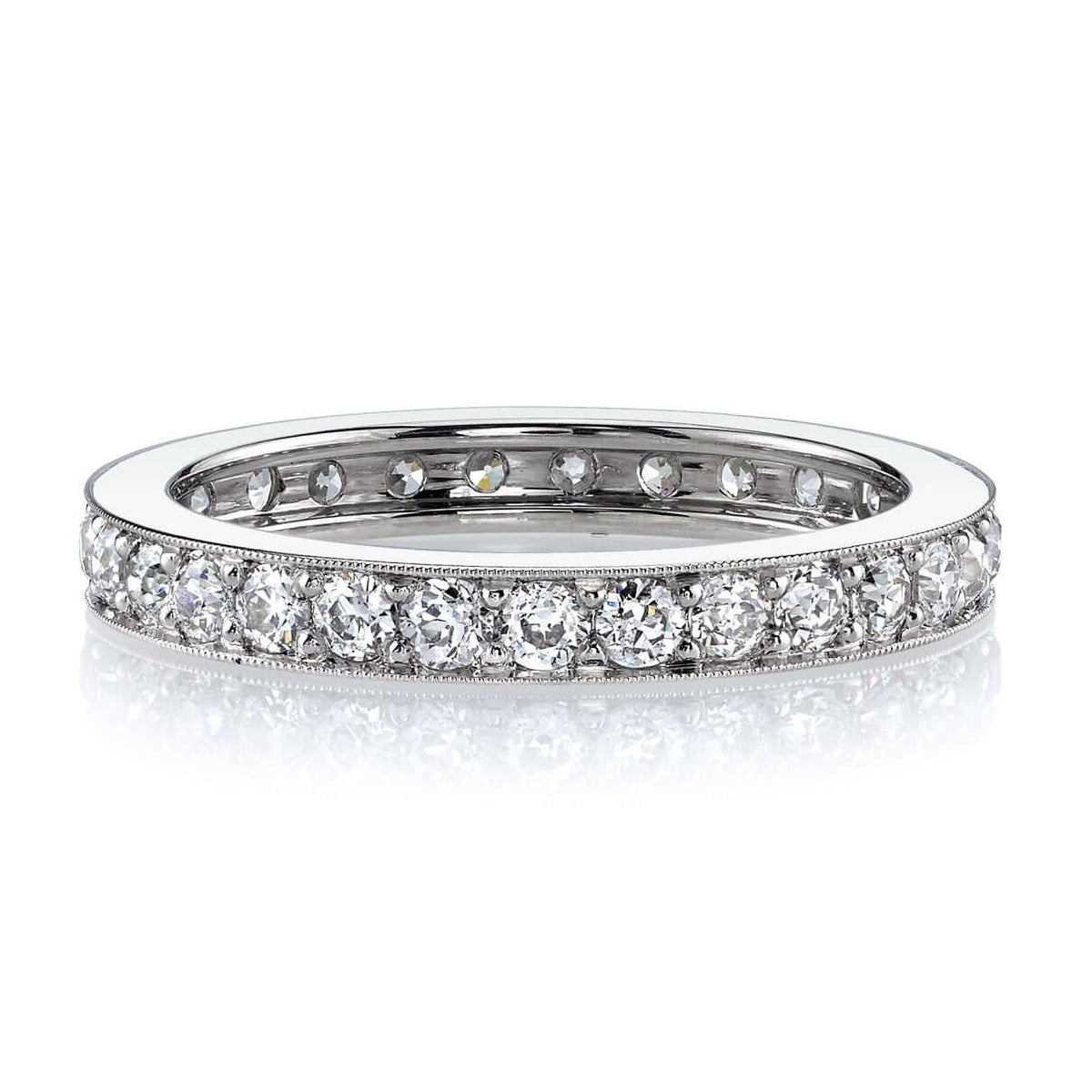 SINGLE STONE CARMELA SMALL BAND | Approximately 1.00ctw G-H/VS old European cut diamonds channel set in a handcrafted eternity band. Approximate band width 2.8mm. Please inquire for additional customization.