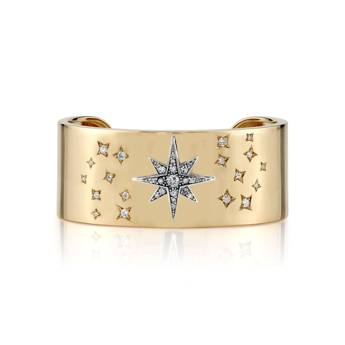 SINGLE STONE ASHLYN CUFF featuring 1.15ctw old European, antique cushion, and round brilliant cut diamonds set in a handcrafted 18K yellow gold cuff.