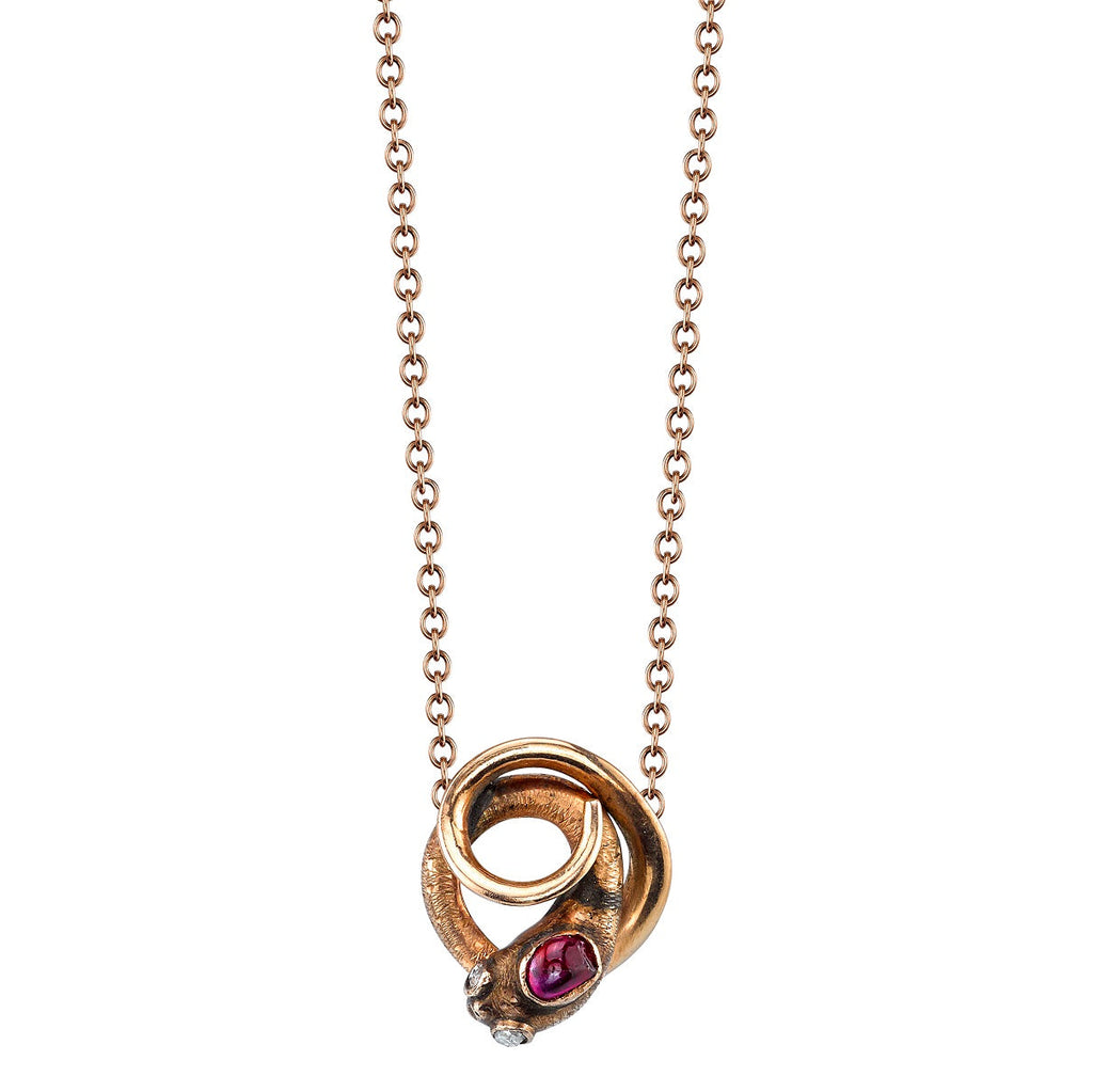SINGLE STONE BENSON featuring 0.06ct rose cut ruby set in a vintage Victorian era 18K rose gold snake pendant on an 18K rose gold link chain.