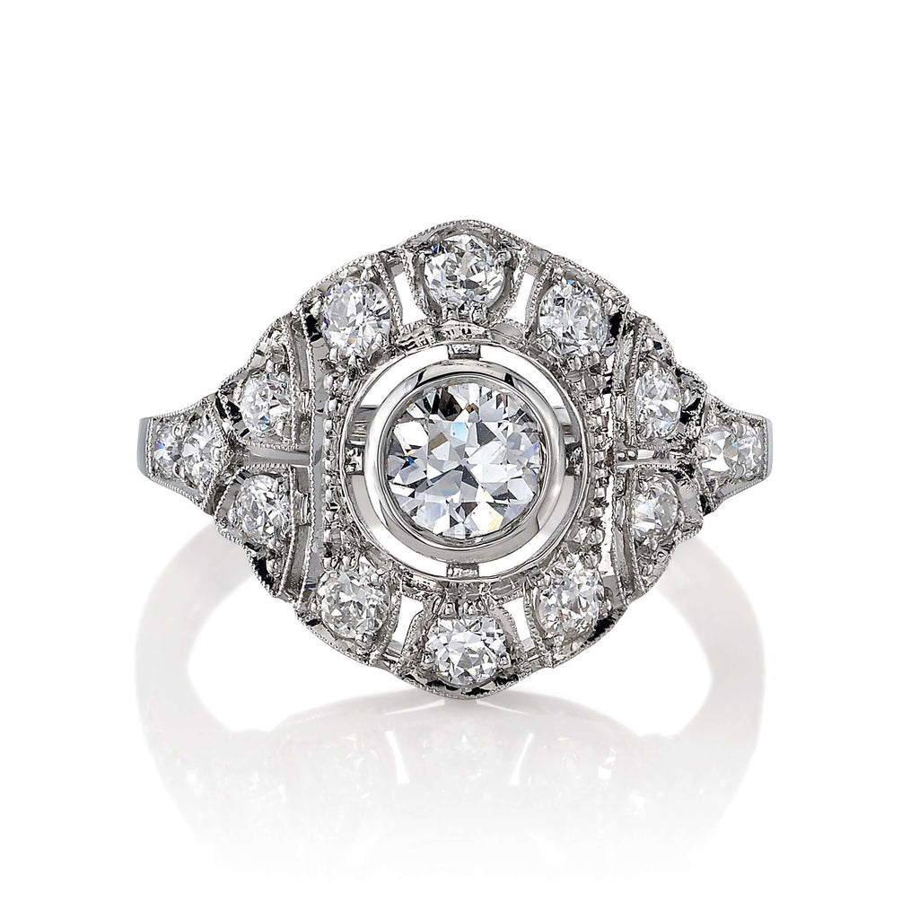 SINGLE STONE RENEE RING featuring 0.48ctw G/VS2 GIA certified old European cut diamond with 0.65ctw old European cut accent diamonds bezel set in a handcrafted platinum mounting.