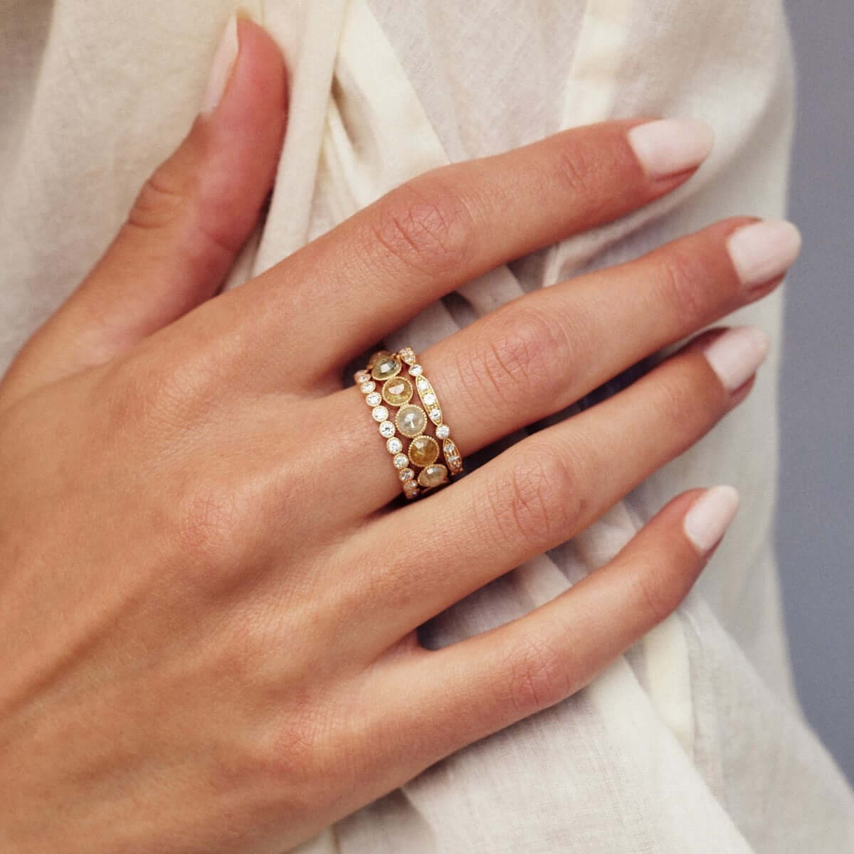 SINGLE STONE MINI GABBY BAND | Approximately 0.70ctw old European cut diamonds set in a handcrafted bezel set eternity band. Approximate band width 2.4mm. Please inquire for additional customization,