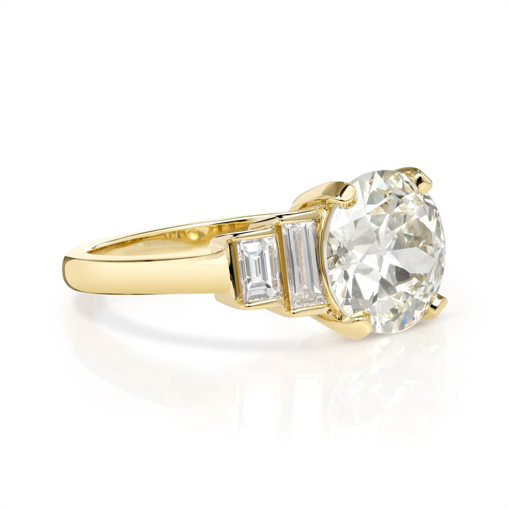 SINGLE STONE SCOUT RING featuring 2.54ct N/VS1 GIA certified old European cut diamond with 0.46ctw baguette cut accent diamonds prong set in a handcrafted 18K yellow gold mounting.