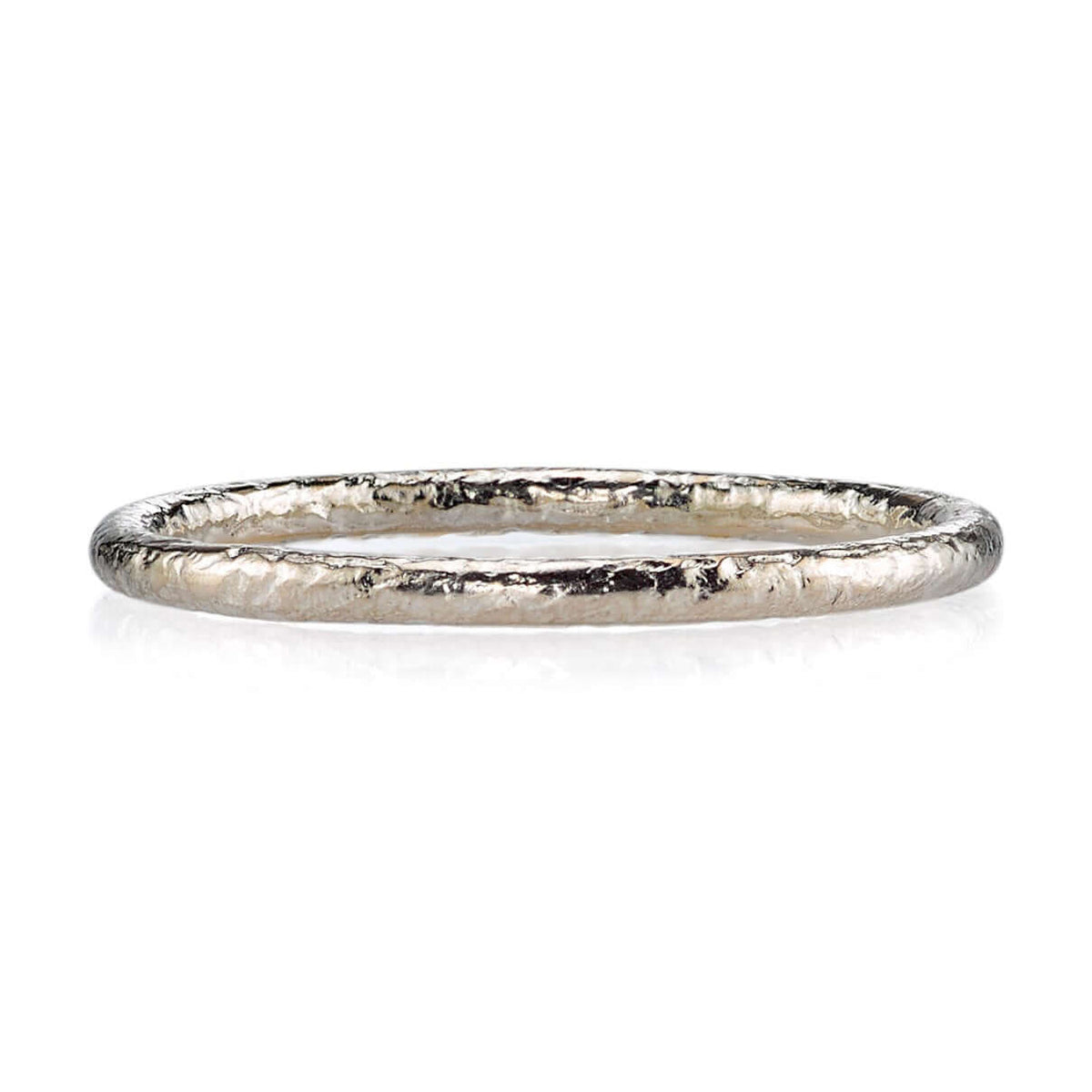 SINGLE STONE SMALL JANE BAND | 1.5mm handcrafted hammer finished gold band. Please inquire for additional customization.