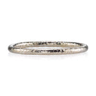 SINGLE STONE SMALL JANE BAND | 1.5mm handcrafted hammer finished gold band. Please inquire for additional customization.