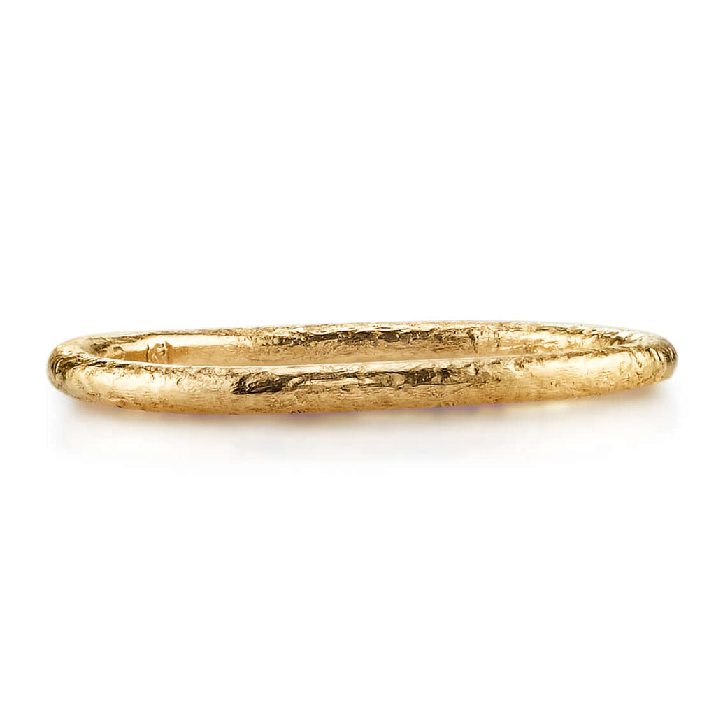 SINGLE STONE SMALL JANE BAND | 1.5mm handcrafted hammer finished gold band. Please inquire for additional customization.